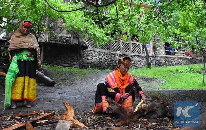 Kalash woman at daily work in the valley